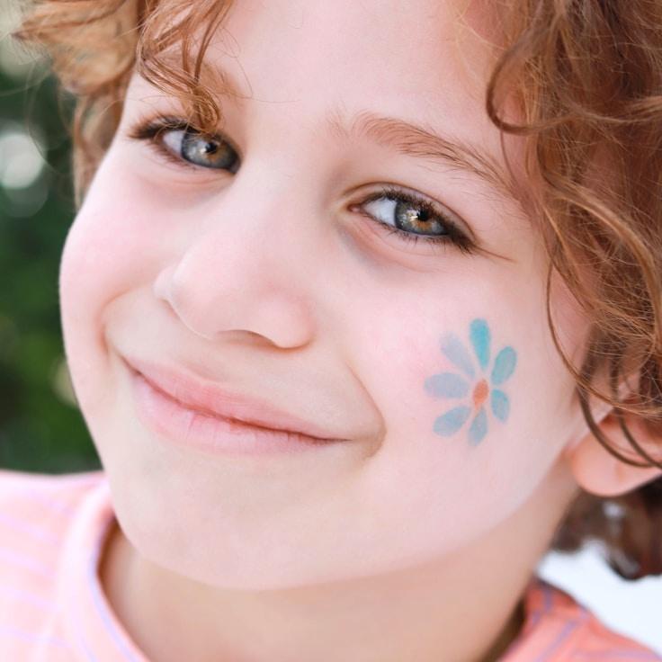 Nora Lin, Lead Design Curator at SteadyCanvasPulse, reviewing corporate floral arrangements